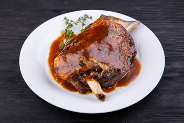 Meat ham baked on grill with sauce
