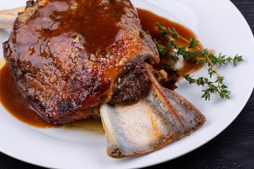 Meat ham baked on grill with sauce
