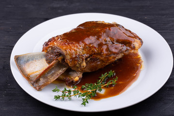 Meat ham baked on grill with sauce
