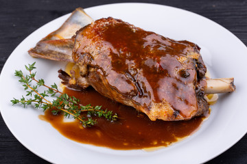 Meat ham baked on grill with sauce
