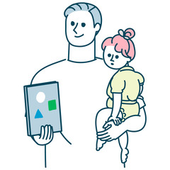 親子　絵本を持つパパ