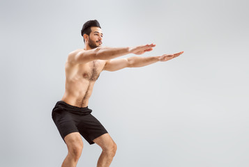 Obraz premium Man is doing exercise.