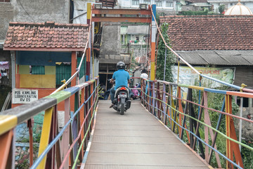 the colorful crossing bridge in Bogor, Indonesia