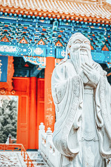 Statue of Confucius, the great Chinese philosopher in Temple of Confucius at Beijing.