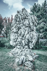 Fototapeta premium Typical Chinese garden, park with bizarre rocks. Beijing.