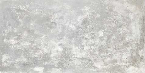 Textura artística de cemento grunge con incrustaciones de guijarros y áreas desgastadas en blanco
