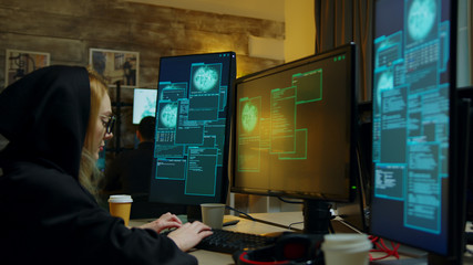 Hooded hacker girl gets access denied while trying to steal