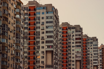 Novorossiysk, Krasnodar region / Bright new row of multi-storey residential buildings at sunny day on black sea. 