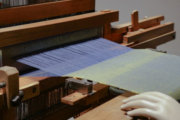 Cloth making machine using threads to create clothes