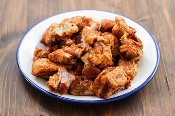 lamb marinated with red pepper, garlic and black pepper