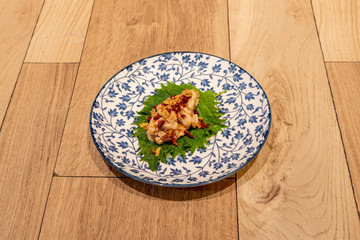 chicken shisho on wooden background