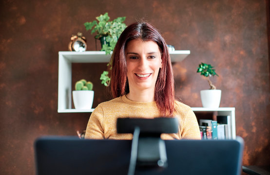 Freelance Woman Working At Home Office Using Web Cam And Laptop - Stay Home Concept