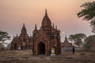 The sun in the sunset of some temples of Bagan. Myanmar