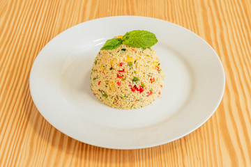 Bowl of couscous with vegetables