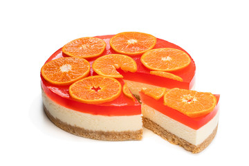 Delicious cheese cake with jellied layer and oranges on top isolated on white