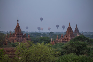 Sunrise with balloons at the temple in Bagan. Myanmar