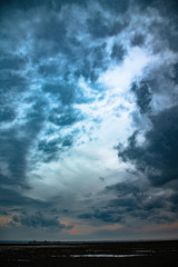 Obraz na płótnie Canvas storm clouds over the sea