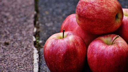 red apples on wooden background