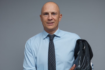 Portrait of a man, an office worker, pleased with his work.