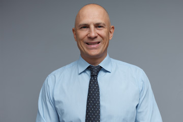 Portrait of a man in strict office clothes.