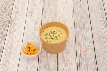 container of vichyssoise to take home