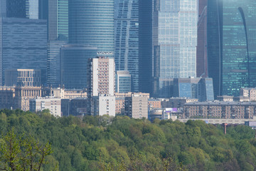 Obraz premium Cityscape with old soviet buildings on the background of moder skyscrapers. Moscow, Russia.