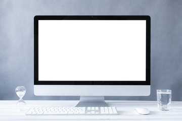 Fototapeta premium Computer all in one mockup, home and office workspace concept. Computer white blank screen on work table front view. Copy space