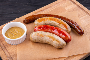 Sausage, sardels and flasks, served to beer with mustard