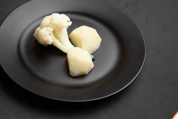 cooked cauliflower dish with potatoes