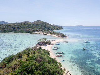 Fototapeta na wymiar Aerial view on fantastic tropical white sand beach islands of Philippines. Coron island beach hopping