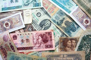 Collection of paper money from different countries as a background