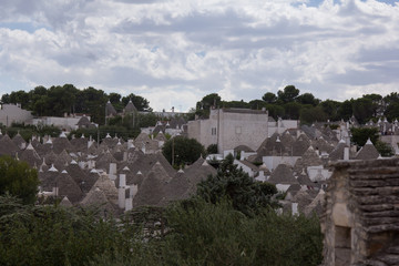 The trulli of Alberobello is a traditional Apulian dry stone hut with a conical roof. Their style of construction is specific to the Itria Valley, in the Murge area of the Italian region of Apulia. 