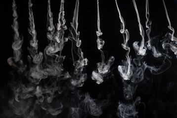 Abstract smoke on a dark background, isolated