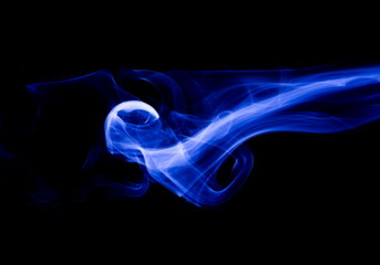 Blue smoke on black background