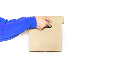 Food delivery. A man in holds a box. isolate copy space.