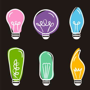 Set of hand-drawn light bulb icons on blackboard. Hand made lamps for decoration of postcards, stickers, web and applications. Vector doodle style illustration on electricity, decor and good ideas. © JuliPaper