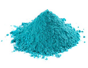 Indian color festival. Blue paint powder, close up