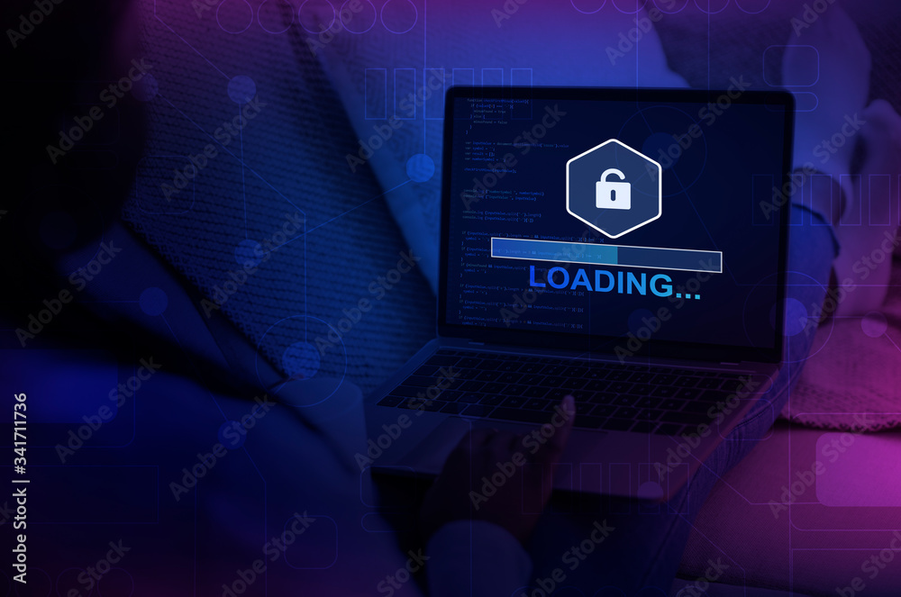 Fototapete Unrecognizable hacker using laptop with progress loading bar