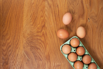 Organic eggs on table, flat lay, background