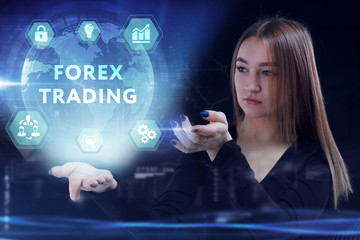 Business, Technology, Internet and network concept. Young businessman working on a virtual screen of the future and sees the inscription: Forex trading