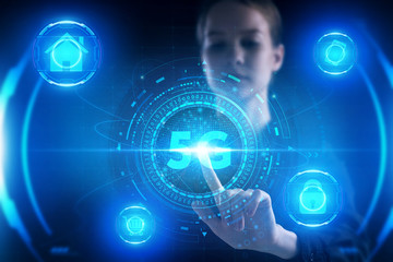 Fototapeta premium Business, Technology, Internet and network concept. Young businessman working on a virtual screen of the future and sees the inscription: 5G