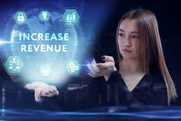 Business, Technology, Internet and network concept. Young businessman working on a virtual screen of the future and sees the inscription: Increase revenue