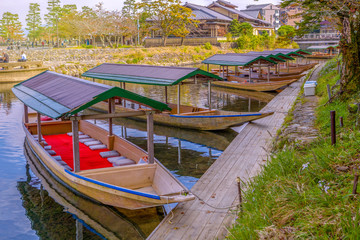 Fototapeta na wymiar Japanese boats. Katsura river in Kyoto