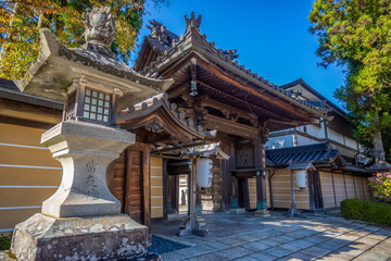 Naklejka premium Koyasan, JAPAN Temple House and Arch on Sacred Koyasan Mountain, Japan