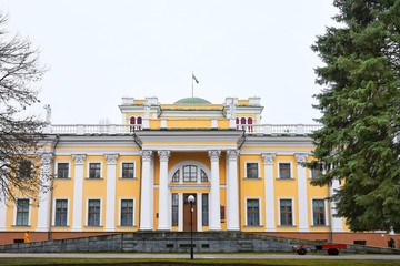 Gomel, Belarus - March 2020. Beautiful Rumyantsev Paskevich Palace in the center of Gomel. Tourist attraction. City park near Rumyantsev-Paskevich Palace. Restored historical building. 