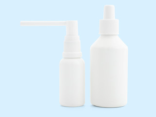 White spray on a colored background, isolate, close-up, mock up. Aerosol and antiseptic in the coronavirus and flu pandemic. A place for your label or brand. Blank for the designer