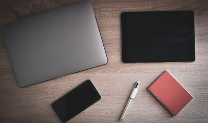 various objects on wooden desk