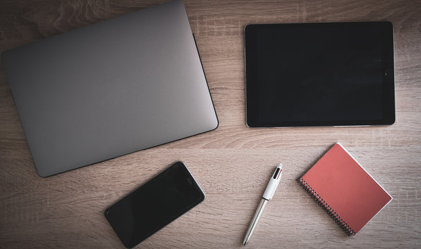 various objects on wooden desk