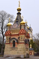 Gomel, Belarus - March 2020. Beautiful chapel-tomb of the Paskevich family in park near Rumyantsev-Paskevich Palace, Gomel. Religion building with smalt mosaic and carved stone on the facade. 