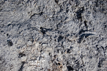 The texture of the ash remaining after the burned fire